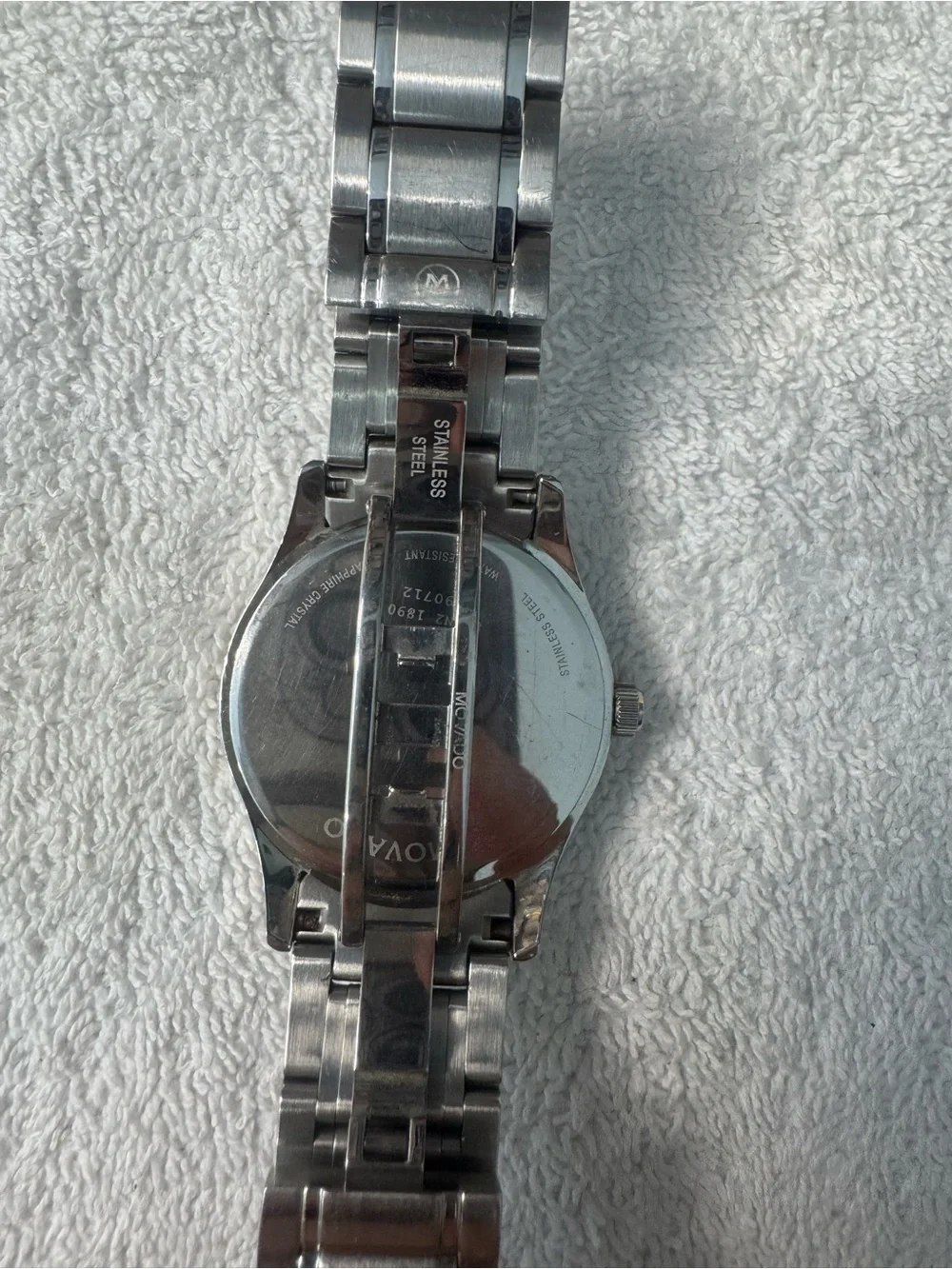 #147 Movado Stainless Steel Watch with Black Dial and Silver Bracelet